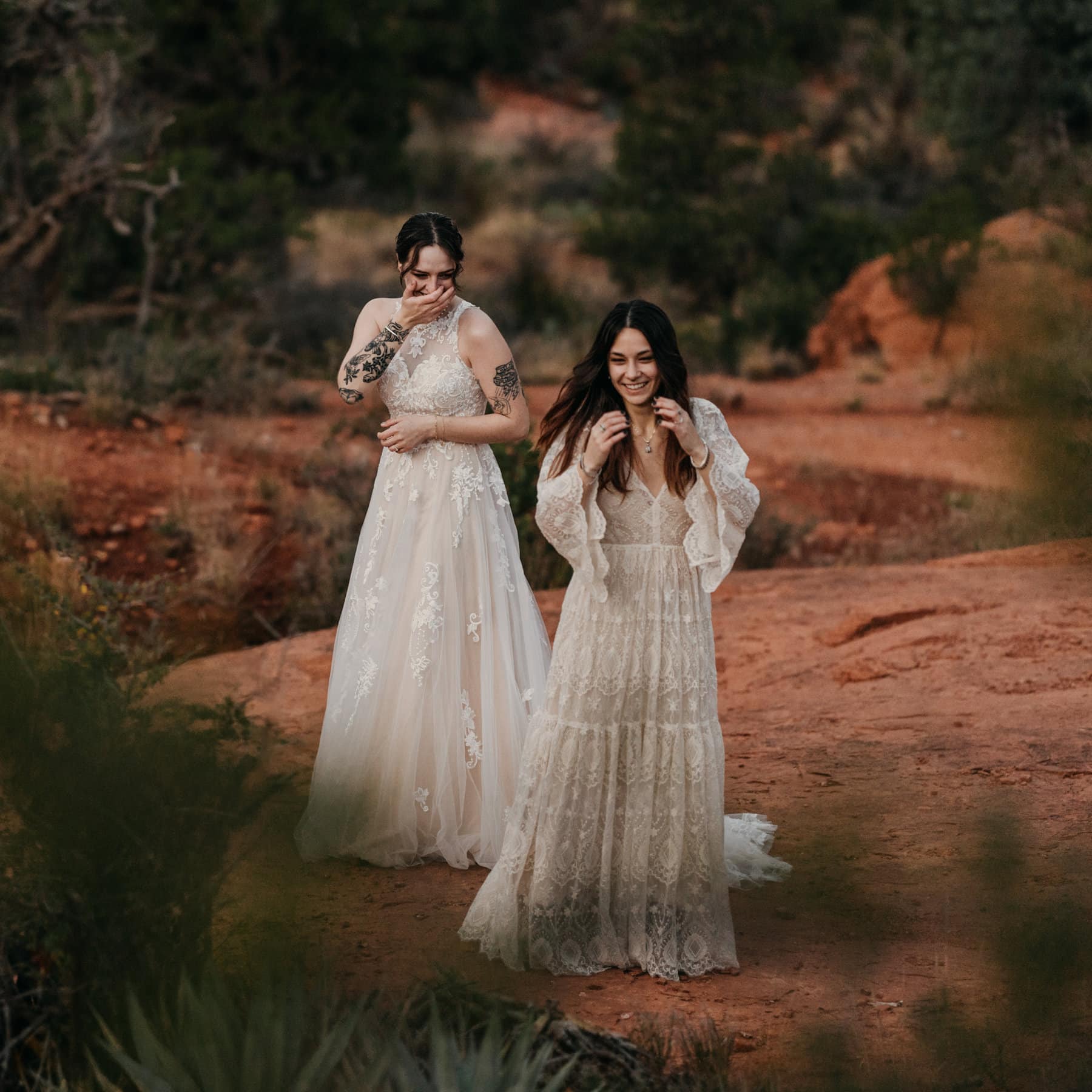 Two brides share a private first look together.