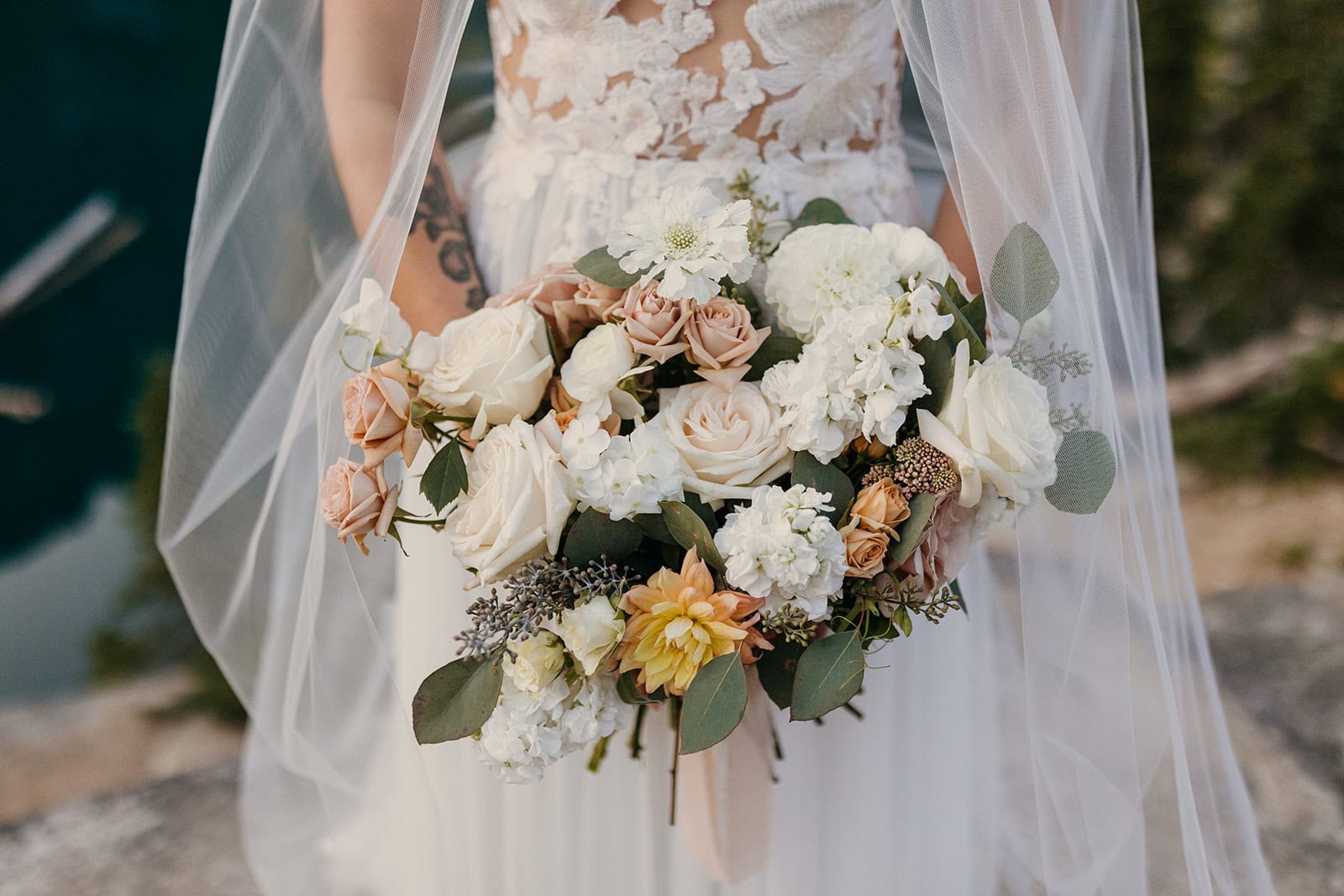 A detail image of a bride holding her boquet.