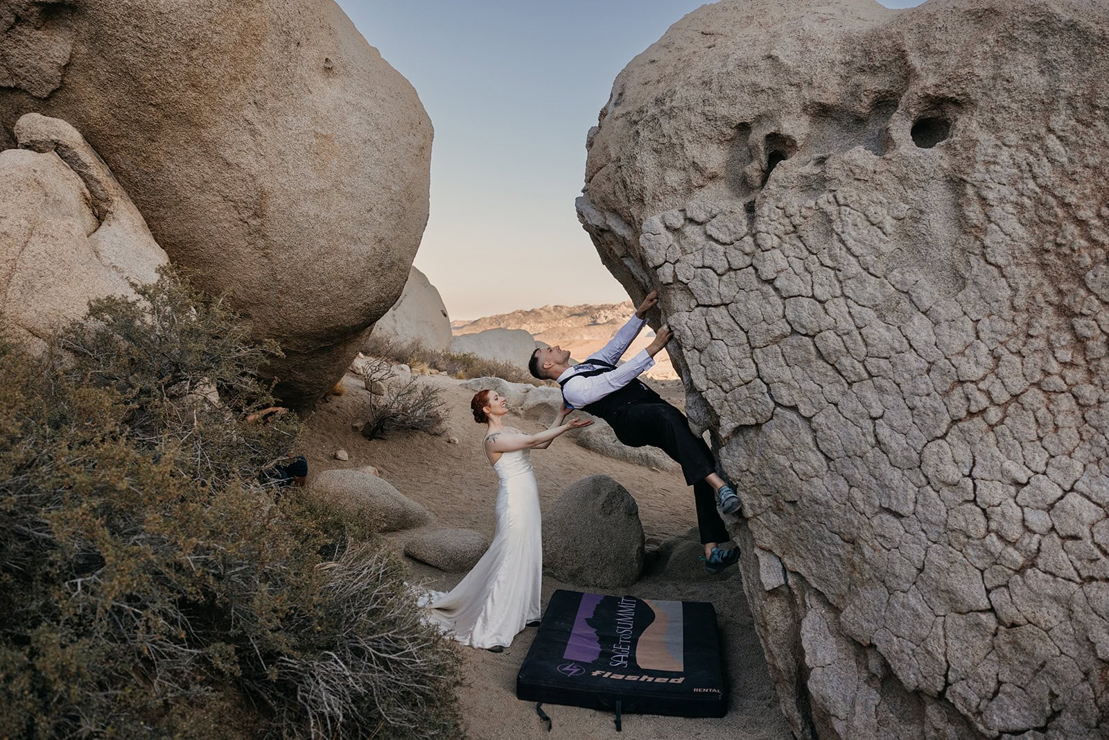 A couple boulders together at the Buttermilks following their adventure inspired wedding ceremony. 