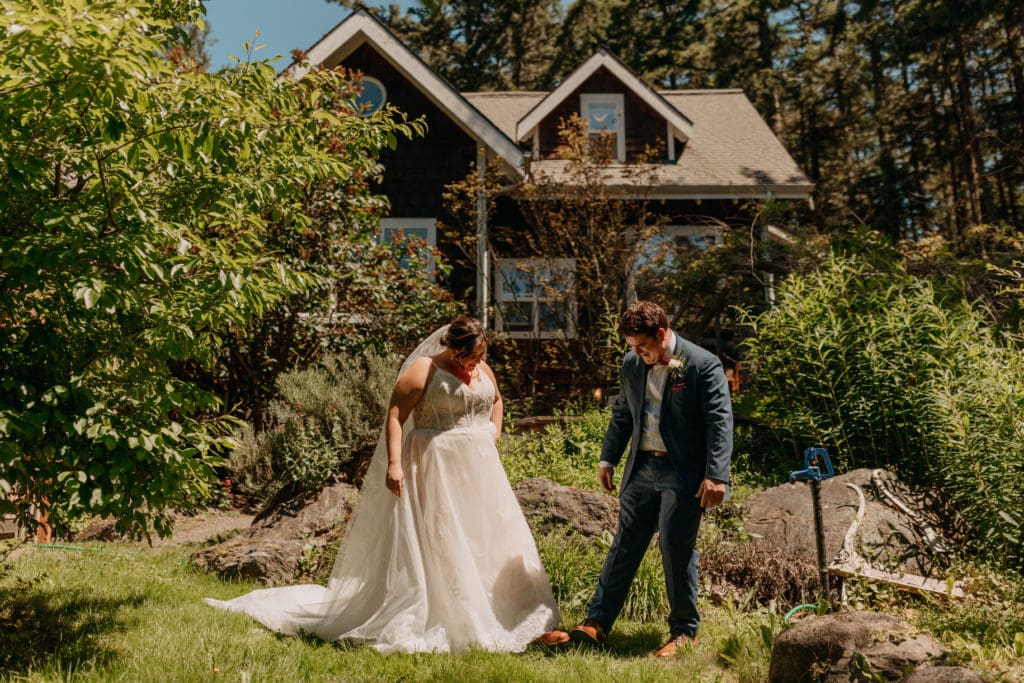 A bride and groom sharing their first look together