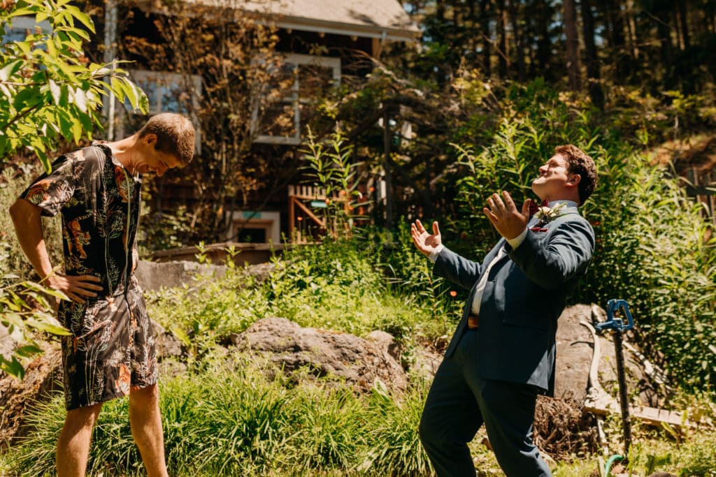 A groom sharing a fake first look with his best friend