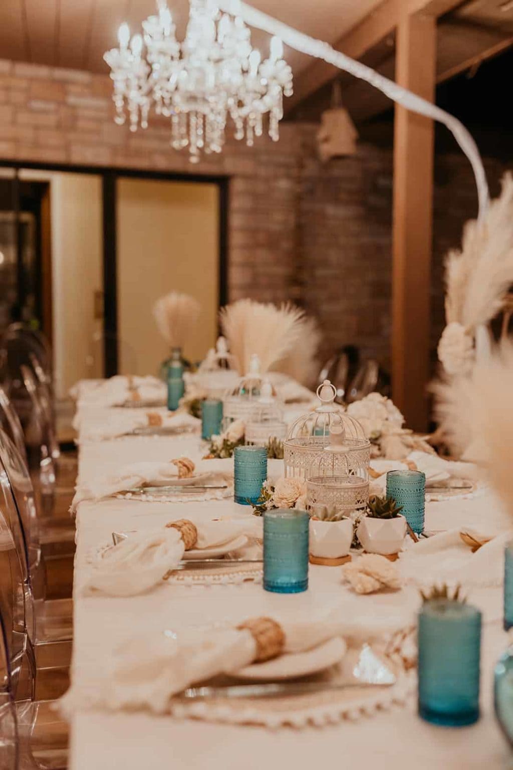 A detail photograph of a table before dinner at a wedding.