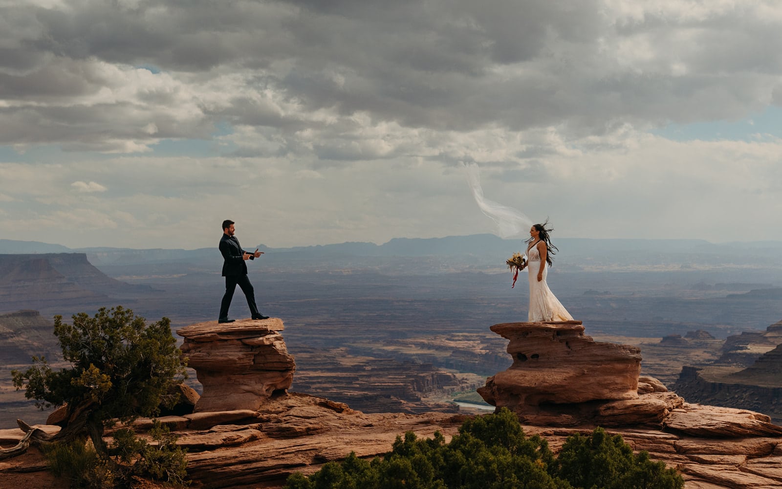 A brides veil blows in the wind.