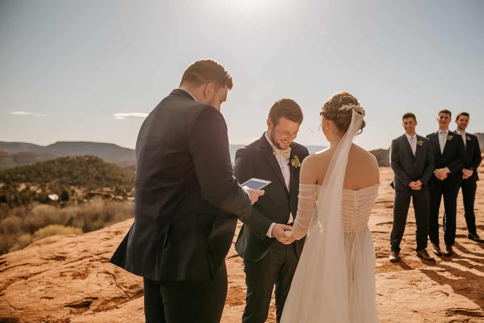 A ceremony in sedona being officiated nearing sunset.