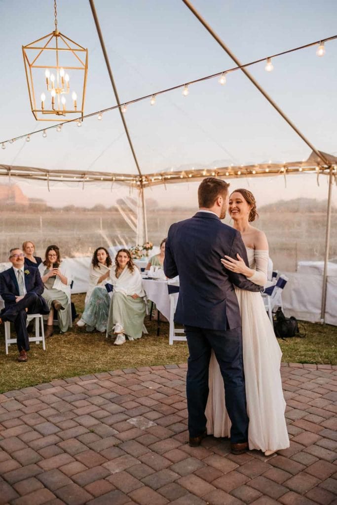 A bride and groom sharing their first dance together.