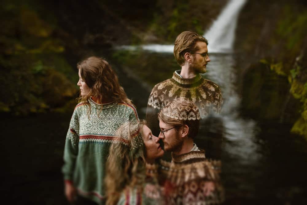 A double exposure image of a couple at a waterfall during their photoshoot in Iceland.