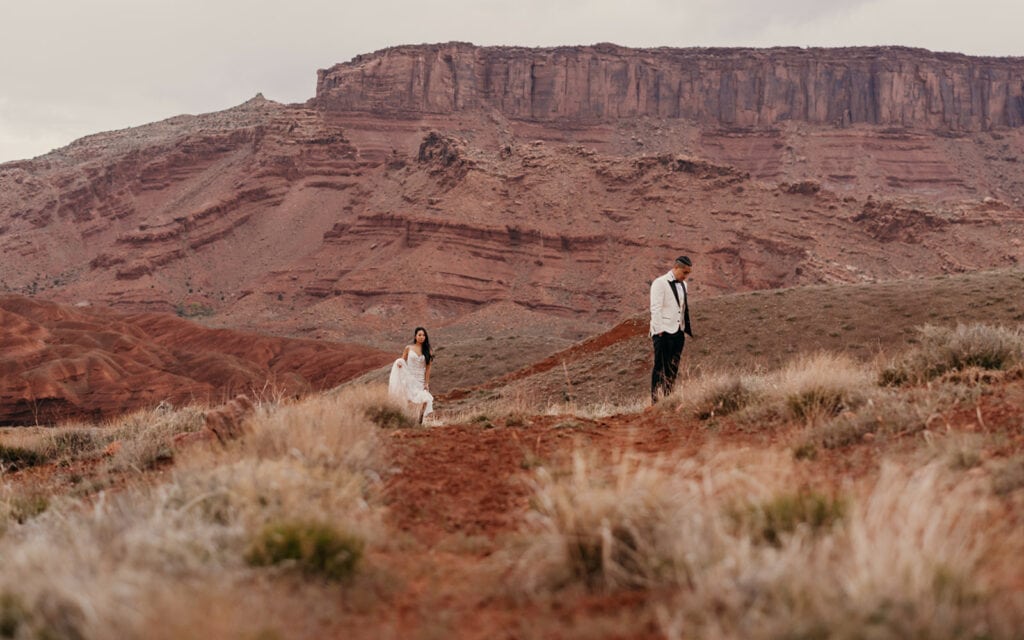The bride walks towards the groom for the first look. 