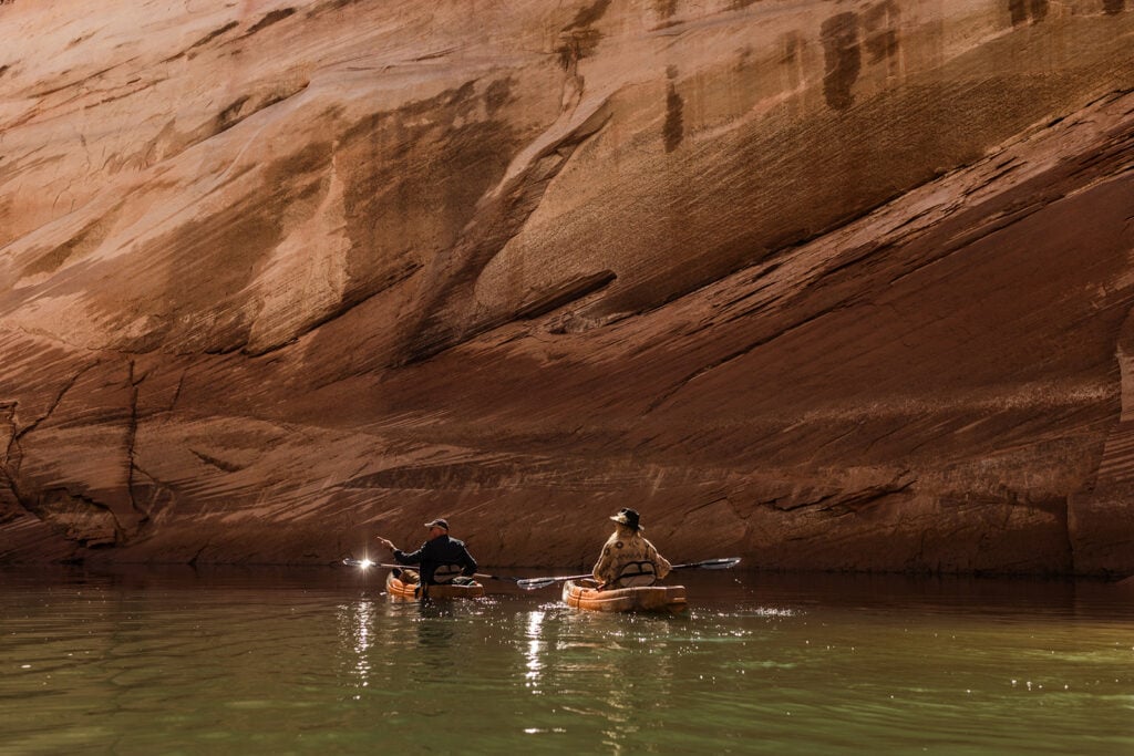 A couple kayaks together on lake powell.