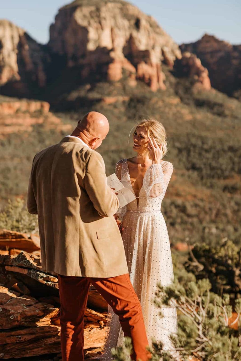 A bride and groom share private vows together