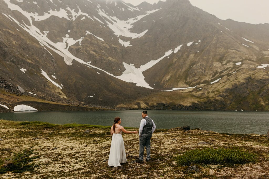 The bride and groom share their first look.