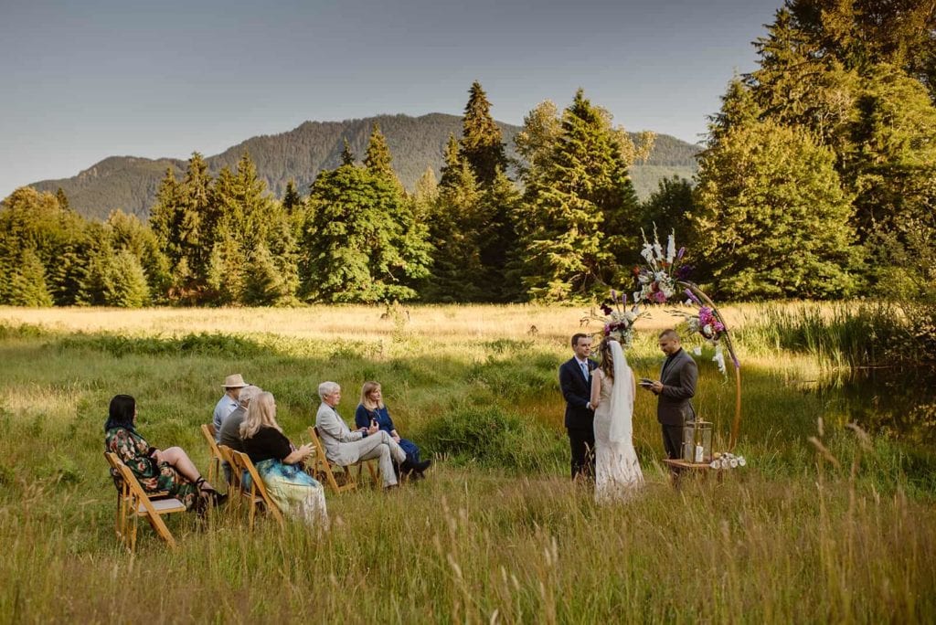 A bride and groom look at each other during their  wedding ceremony.