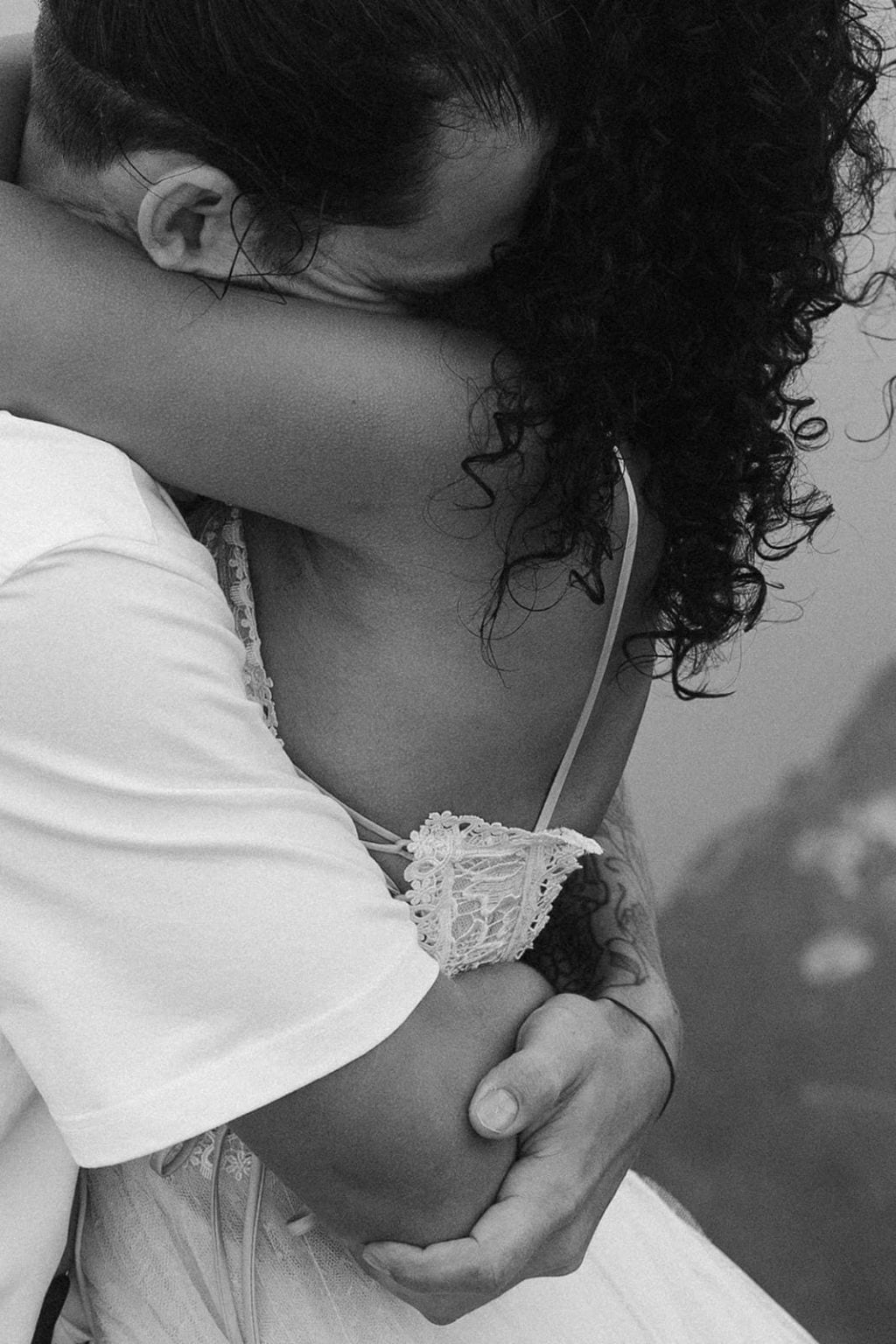 Goose bumps on a brides arm as there is a chill in the mountain air.