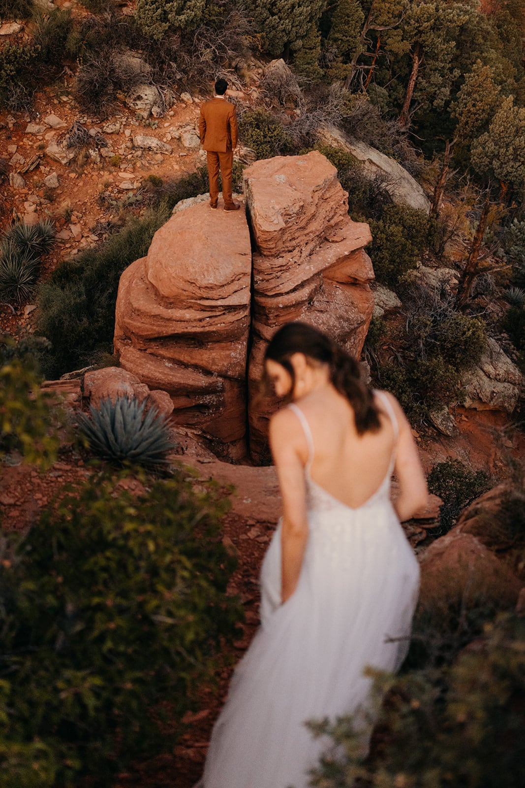 A bride walks over to her groom for their first look.