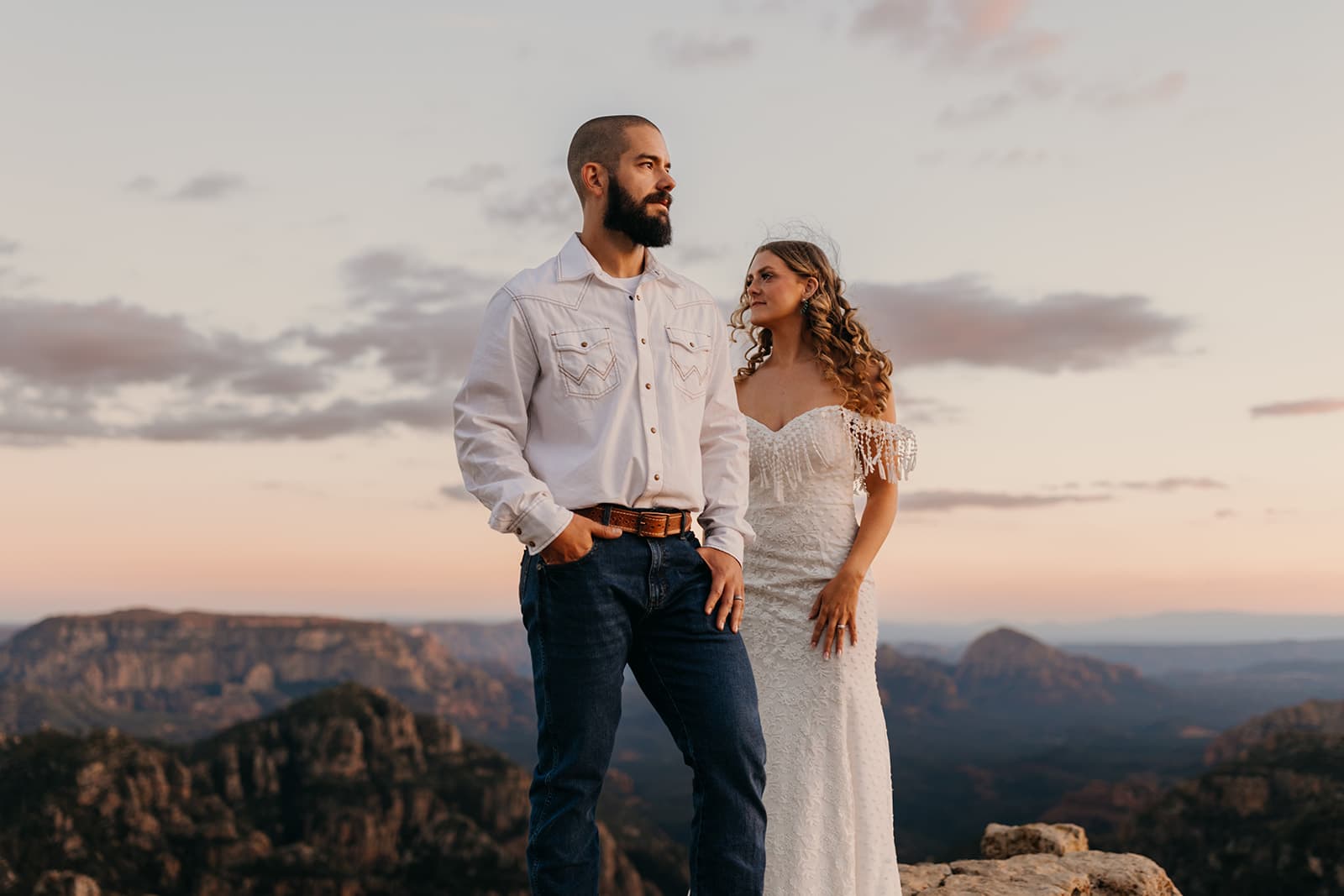 A bride wearing an elopement dress from dreamers and lovers.